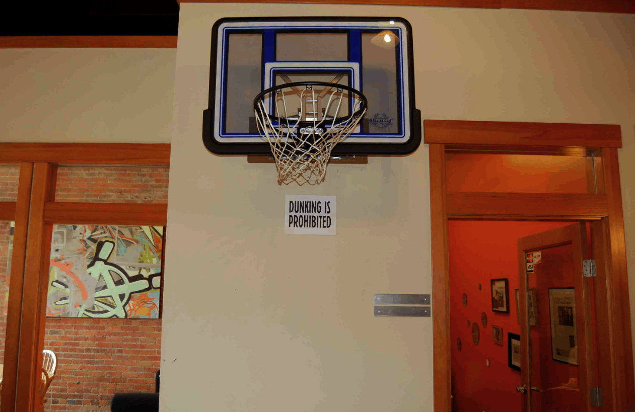 A Regulation Basketball Hoop in the Office Tatango Retail SMS