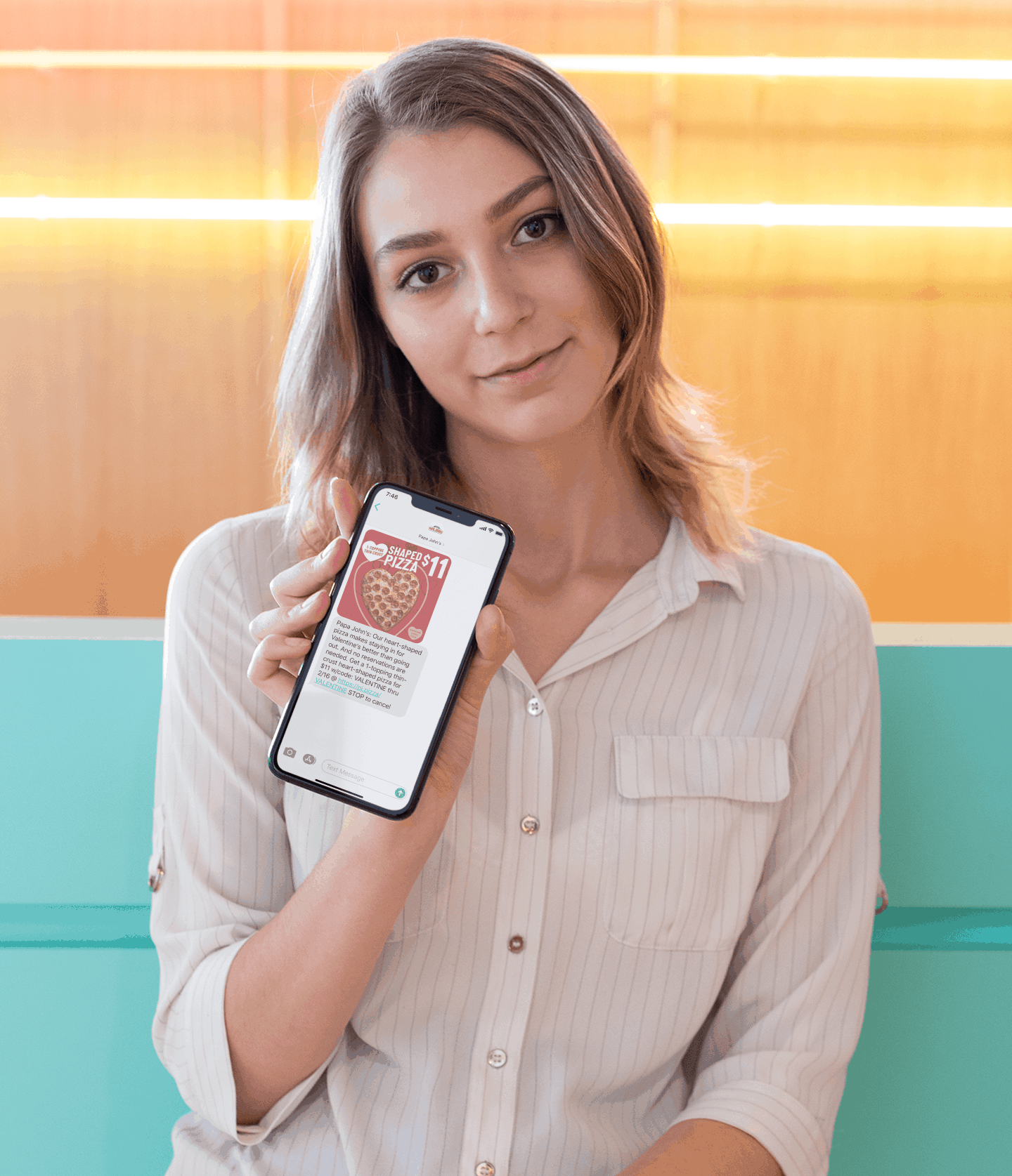 Woman with Papa Johns Text Message Coupon