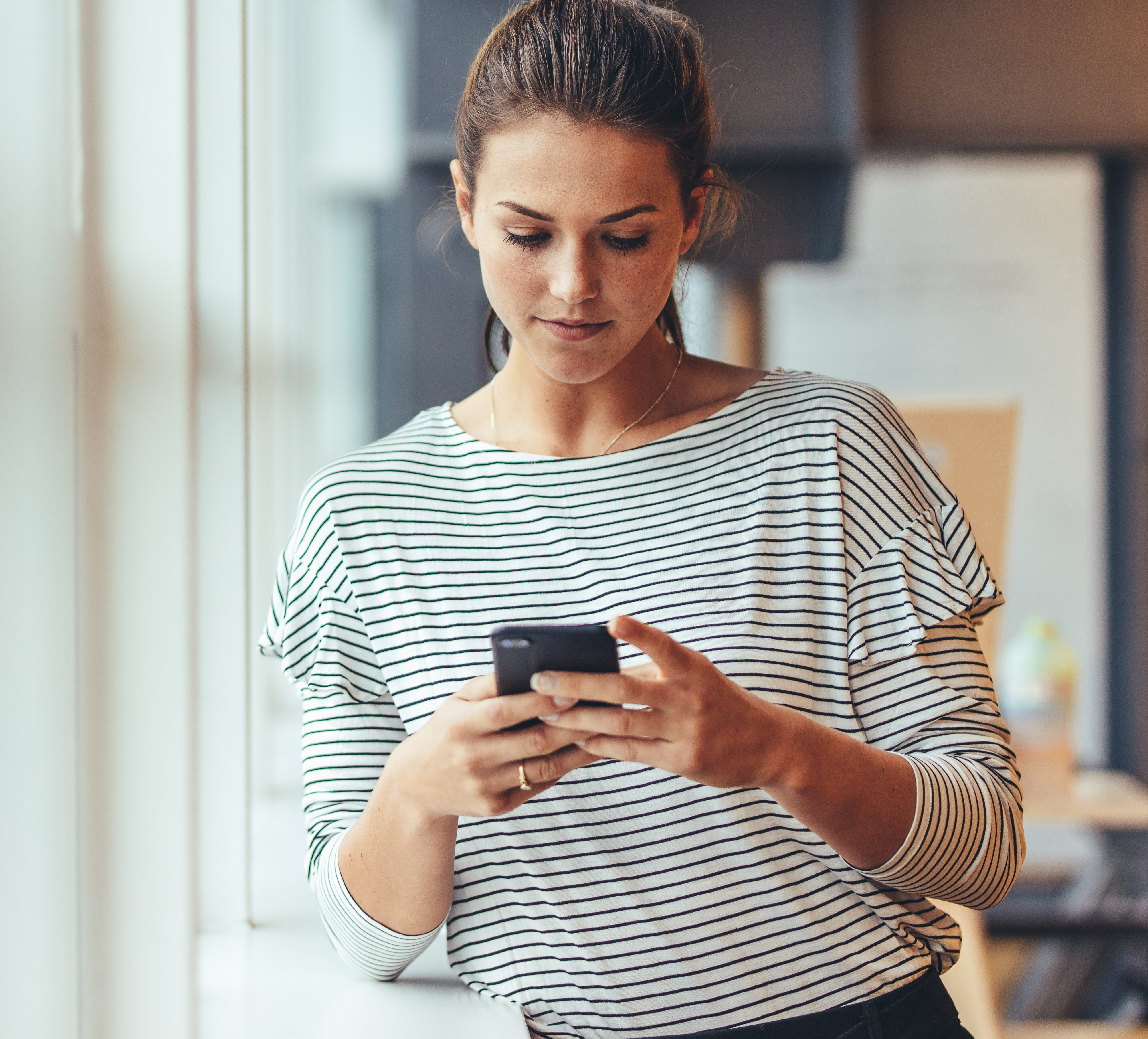 Businesswoman using mobile phone